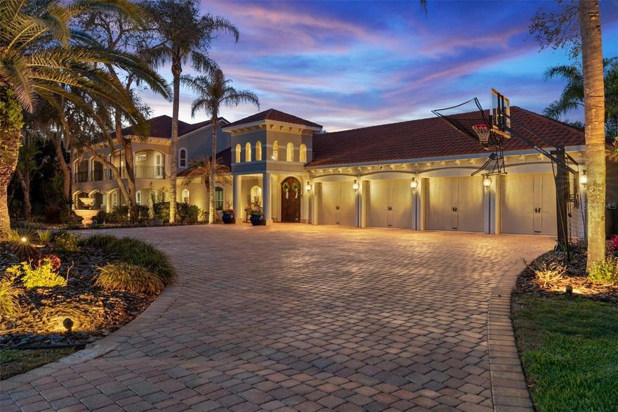 A TRUE MASTERPIECE - This fully upgraded Mediterranean compound spans 5,825 square feet surrounding a STUNNING courtyard built only for the most refined palates -- all privately positioned on a cul-de-sac, with no HOA, on 1.13 acres in one of Port Orange's top-rated school zones.

Designed around the most inviting pool oasis, this estate features a versatile layout ideal for multi-generational living and long term guests, with each spacious bedroom offering an en-suite bath. Expansive living areas provide ample space for entertaining at scale and everyday comfort, while the thoughtful upgrades make it an unforgettable statement. 

Current owners invested significantly in ideal improvements, including:
• Remodeled primary bath
• Remodeled junior en-suite 
- Two tankless gas water heaters 
- Whole-house water filtration system 
- New Café appliances in the bar & Bosch dishwasher
- Mudroom built-in, Closet built-ins, Murphy bed
- New pool pumps and wireless pool controls
- Exterior LED lighting, with Speakers & Video

These upgrades provide true turn-key luxury with minimal deferred maintenance. 

The 4-car garage with oversized attics offer exceptional storage and flexibility. Located minutes from top-rated schools, the Pavilion, the Intracoastal and pristine beaches, this estate combines architectural character with modern mechanical upgrades in a highly sought-after location.

Private showings available by appointment only.