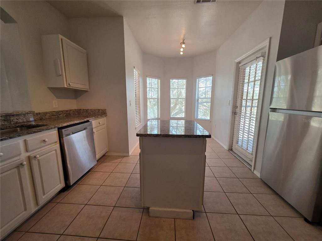 Photo of 191 Villa Di Este Terrace #205, Lake Mary, FL 32746 (MLS # O6382640)