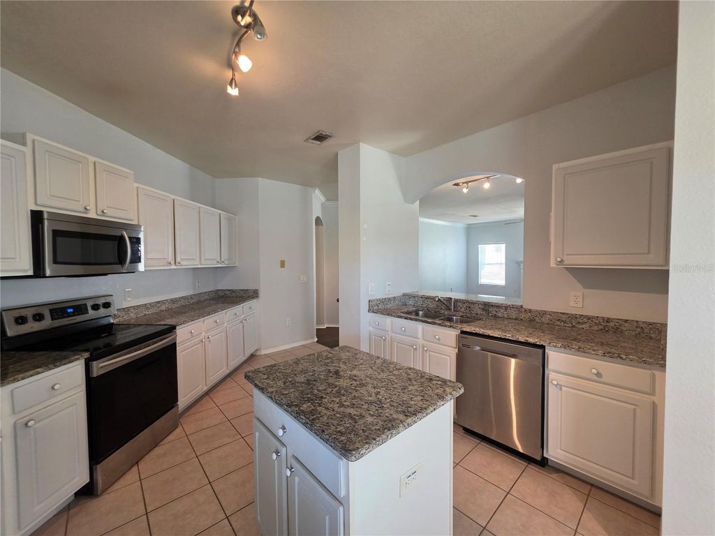 Photo of 191 Villa Di Este Terrace #205, Lake Mary, FL 32746 (MLS # O6382640)