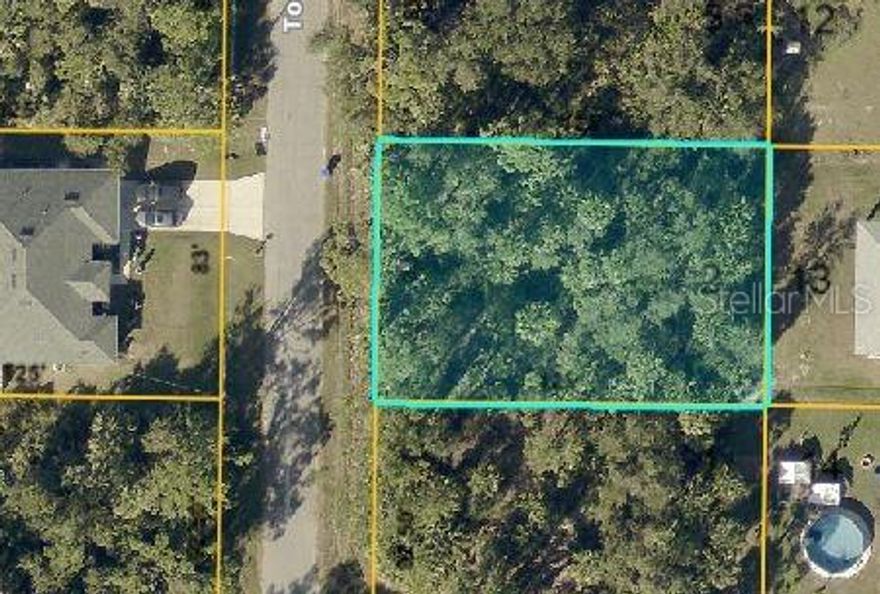 Discover this beautiful vacant lot in North Port, FL, perfectly situated in a quiet neighborhood with convenient access to shopping, dining, and I-75. Power lines already run nearby for easy connection, and the property will require a well and septic. Enjoy the freedom to design your ideal home in one of Southwest Florida’s fastest-growing areas! A member/manager of the owning LLC is a licensed real estate agent.