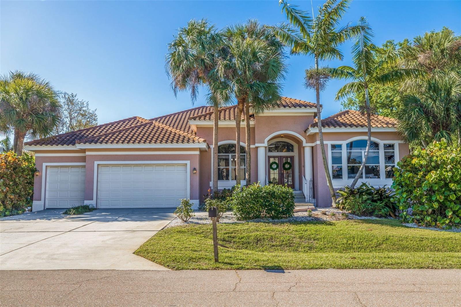 Under contract-accepting backup offers. Welcome to this jewel on Columbus Dr in Tierra Verde, just a stones throw from the gulf. Upon entering, you will immediately appreciate this open and bright home with 10ft ceilings and lots of natural light. This single level home features recent renovations that include - new kitchen with cabinetry, quartz (Cambria) counter tops, stainless steel appliances, cooktop island and built in desk. The family room features a brand new electric fireplace that has been beautifully tiled. Immerse yourself in the Florida lifestyle with your very own screen enclosed pool which has been recently redone - tiled, pebble tech, new equipment and rejuvenated pavers. The owners suite is massive and features 2 walk in closets and a renovated en-suite bath with soaking tub, walk in marble tiled shower and water closet. Along with 2 large guest bedrooms, this home also has a spacious office with stately built ins and plenty of room for extra guests. Recently replaced duct work and energy efficient insulation will keep you cool all summer long! Plus, you'll have the added convenience of a 3 car attached garage where you'll have a secure space to park your cars, bikes or other recreational gear. Tierra Verde is the hidden gem of St Petersburg, and this home is nestled in a safe and welcoming neighborhood. Enjoy the best of both worlds with a convenient 15-minute drive to downtown St Petersburg, 30-minute drive to vibrant Tampa, 10 minutes to the beaches and Fort Desoto. Don't miss out on experiencing the ultimate coastal lifestyle in this beautiful Tierra Verde home.