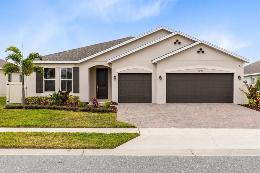 Must see!! Beautiful 1 story home with 4 bedrooms, 3 full bathrooms and 3 car garage located in the highly desired Park View at the Hills community. The pristine condition of this home features tile flooring throughout, spacious gourmet kitchen with 42" grey shaker cabinets, quartz countertops, subway tile backsplash, stainless steel appliances, natural gas stove and walk-in pantry. Special touches throughout the home include high ceilings, indoor laundry room, an oversized primary bedroom with en-suite bathroom, walk-in closet and tray ceiling. The open floor with split bedrooms offers the perfect use of space. Enjoy your tranquil screened patio overlooking the spacious fenced-in backyard. Eye catching curb appeal with landscaped front lawn and brick paver driveway. New updates include interior and exterior paint, carpet in bedrooms, front door, garage doors, garage door openers, range hood, vinyl fence, screened enclosure, double pane  insulated glass in windows and sliding glass door. Location, Location, Location!!! Easy access to the community pool, playground and Minneola Athletic Complex. Conveniently located in the heart of Minneola, one of the nation’s fastest growing communities. Top Rated Schools. A stones throw from Orlando Health South Lake Hospital and National Training Center,  Advent Health Minneola, Historic Downtown Clermont, Florida’s Turnpike and all major shopping, dining, entertainment.