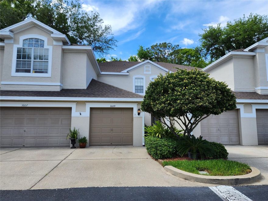This beautiful 2 bedroom townhome has an amazing view of the wildlife preserve and Lake St. George in the distance. Relax in the community pool with a cool beverage or cook up your favorite meal in the kitchen fit for a chef. New carpet adorns the bedrooms and hard flooring graces the extended living room and kitchen. Your primary bedroom boasts of dual closets and an on-suite bath. Enjoy easy living at it's best. The HOA includes your roof, exterior maintenance, trash, lawn and also cable and internet services. You have an inside laundry between the bedrooms for convenience and an oversized garage. Central to everything; shopping, entertainment, airports and beaches. Priced to go fast, this home is move in ready; All that's missing is you. Call today for a private tour.
