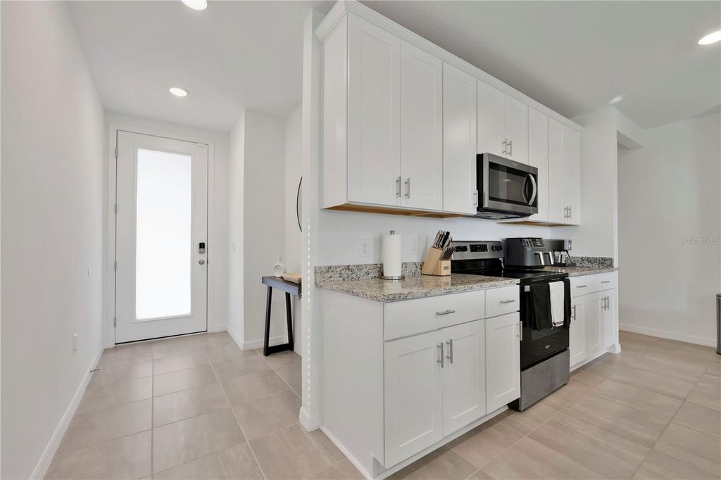 Photo of 1482 Sea Glass Road, Haines City, FL 33844 (MLS # O6359528)