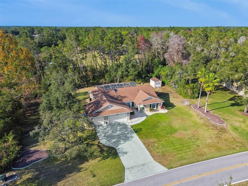 Photo of 11179 Woodland Waters Boulevard, Weeki Wachee, FL 34613 (MLS # TB8454099)