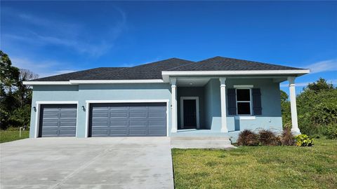 Photo of 12120 Kingsbury Avenue, Port Charlotte, FL 33981 (MLS # L4956476)