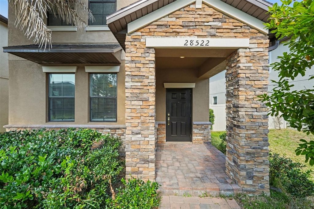 Photo of 28522 E Pleasant Bay Loop, Wesley Chapel, FL 33543 (MLS # O6402831)