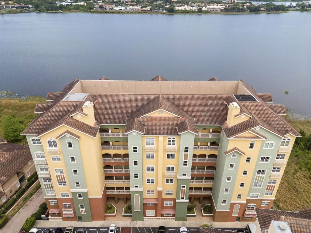 Photo of 8743 The Esplanade #34, Orlando, FL 32836 (MLS # O6404038)