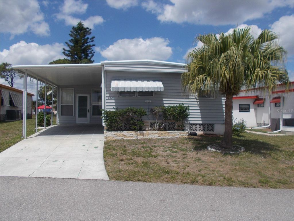 Photo of 5580 Holiday Park Boulevard, North Port, FL 34287 (MLS # C7524084)