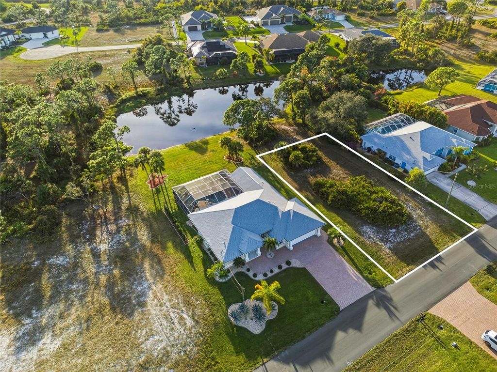 Photo of 114 Tournament Road, Rotonda West, FL 33947 (MLS # D6145446)