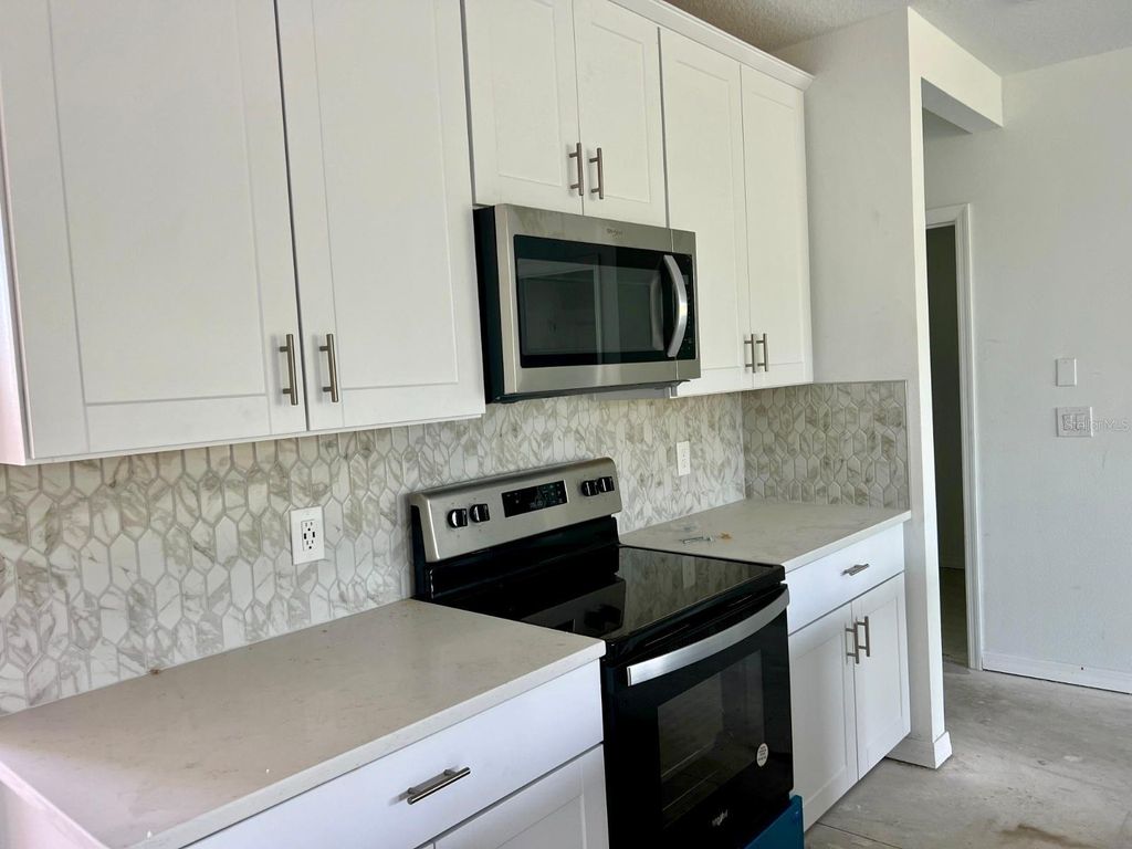 Photo of 4501 Burrowing Owl Loop, Saint Cloud, FL 34772 (MLS # O6403674)