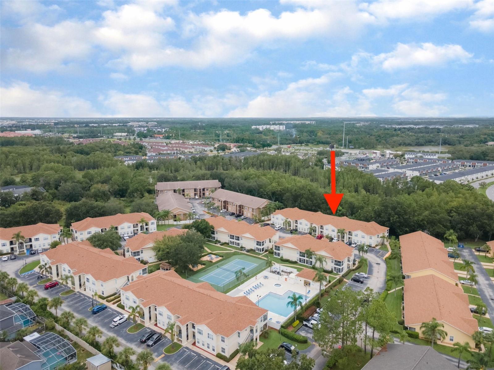 Discover your next investment or vacation haven with this fully furnished, ground-floor condo in the highly sought-after Grand Palms community! This exceptional 3-bedroom, 2-bathroom unit offers the perfect turnkey opportunity, whether you're looking for a permanent residence, a seasonal escape, or a lucrative rental property. The inviting open-concept living space effortlessly connects to a private, screened-in patio with a tranquil forest view, offering a peaceful retreat to unwind after a day of fun.
As a resident of Grand Palms, you'll have instant access to resort-style amenities, including a sparkling community pool, a well-equipped fitness center, and tennis courts—all just a short walk from your front door. Beyond the community, the best of Central Florida awaits. You'll be minutes away from world-class attractions like Walt Disney World and Universal Orlando Resort, along with an endless array of dining, shopping, and entertainment options. This is a rare chance to own a piece of paradise in a prime location.