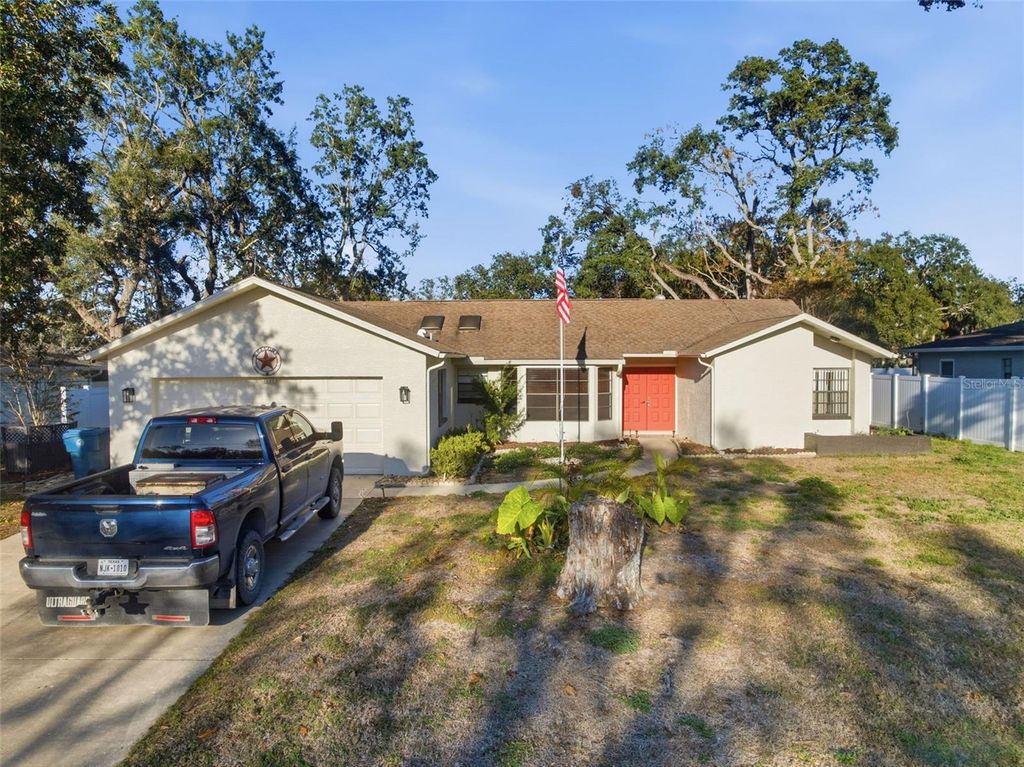 Photo of 7822 Holiday Drive, Spring Hill, FL 34606 (MLS # W7881472)