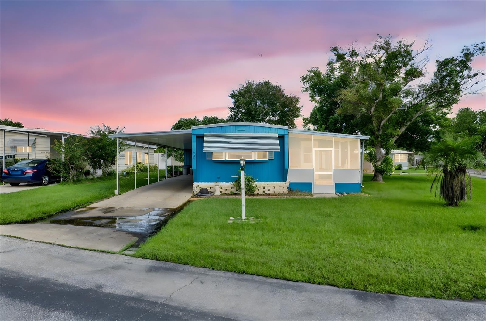 GREAT HOME! Welcome to KOVE ESTATES, a community that offers resort-style living, comfort, and convenience. This 55+ Co-Op, Gated Golf Course community offers all the fun without all the fuss. This home features 2 bedrooms, 2 bathrooms, a spacious family room kitchen combo. The enclosed Florida room ideal for relaxing and entertaining during the cool Florida evenings. The home also has an indoor laundry/Storage room, an oversized carport. Membrane Roof, Updated Subfloors, New Flooring, Replumbed, Water Softener, Screened Porch, updated bathroom and extra storage room. This home is equipped with a Mini-Split System allowing you to control the temperature for individual living areas. KOVE ESTATE is a 55+ CO-OP Community Resort Style Living at its finest, enjoy all the thrills without all the fuss. There is no lot rent, as a share in the community conveys with the sale. With a monthly cooperative fee of $298 which allows you to Enjoy Year Round 9 Hole Golf Course, 2 pools, one heated, tennis courts, pickle-ball, community events and the peaceful nights all in your very own gated community. Located just outside of Historical Sanford Fl. Sanford Airport is minutes away, Daytona Beach 40 minutes, Disney 45 Minutes away. The perfect spot to call home