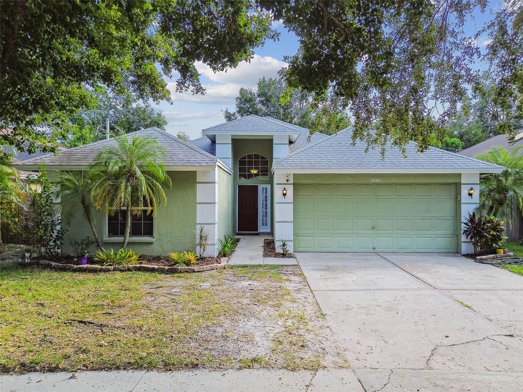 Photo of 5646 Paddock Trail Drive, Tampa, FL 33624 (MLS # TB8433986)