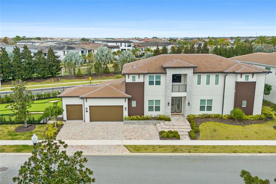 NEWLY UPDATED IN 2026 WITH AMAZING (75 x 42 ft | 3,150 sq.ft) PRIVATE "PUTT PUTT" MINI GOLF. A feature this large is very unique. This luxury resort home is located in the Bears Den Neighborhood of Reunion Resort with active membership. Open floor plan and offers superb gathering spaces for you and family to enjoy. The backyard area is truly exceptional with seating for all your guests lounge around in the Florida sunshine. Dive into the oversized pool or relax in the hot tube with friends. There is space to significantly extend the pool deck to stand out from the competition. This potential upgrade would likely result in greater rental revenue. Reunion Resort is located just 6 miles from Walt Disney World and centrally located to all the other great attractions in the Orlando area. There is currently $71k of guest bookings in place for 2026. Any future bookings after closing would convey to the new owner should they decide to keep the home in the current vacation rental management program. The popular vacation rental has themed rooms that will make families feel like they’re having a one-of-a-kind getaway. The open living area is a great gathering spot for the family to enjoy each other's company with comfortable seating including a leather sectional overlooking the private pool deck as well as a feature fireplace. The fully equipped kitchen offers a four-seat breakfast bar and a dining table for seating up to twelve for a meal at any time of day.  This home can accommodate up to 16 guests, providing plenty of space with two king-sized suites on the bottom floor and an additional king-sized bedroom with a shared family bathroom adjacent. On the second floor, you will find a further king-sized suite, a superhero-themed bedroom with two sets of bunk beds (4x twins) and a connecting bathroom as well as a candy-themed bedroom with two sets of bunk beds (4x twins) and a connecting bathroom.  Once you get to the loft area on the second floor, you will be amazed by all its entertainment with a pool, foosball, and air hockey table for plenty of entertainment as well as a video game-themed games room equipped with arcade games and a home theater with a large flat-screen TV. The outdoor deck offers a private swimming pool and spillover spa to enjoy Florida's warm weather as well as a summer kitchen for all your grilling needs and a fire pit. The home gym also allows for some exercise and relaxation while on vacation.