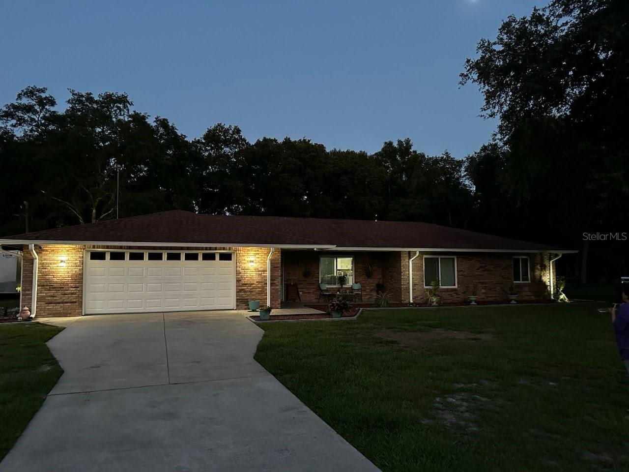 Great opportunity to rent this unique brick home that offers a perfect blend of timeless charm and modern upgrades. Situated on a tranquil 1.11-acre lot beautified with majestic oak trees. The property features a private backyard oasis with a pool, waterfall, and covered lanai, ideal for relaxation or entertaining, complemented by a fully fenced yard with dual gated entrances for privacy. Inside, the spacious split floor plan boasts brand-new tile flooring recent upgrades including sleek sliding glass doors and new energy-efficient windows, all enhancing comfort and natural light. This home offers both luxurious and highly functional, truly a serene retreat with ample storage, including an oversized garage and shed. A must see!