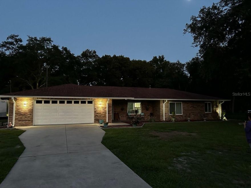 Great opportunity to rent this unique brick home that offers a perfect blend of timeless charm and modern upgrades. Situated on a tranquil 1.11-acre lot beautified with majestic oak trees. The property features a private backyard oasis with a pool, waterfall, and covered lanai, ideal for relaxation or entertaining, complemented by a fully fenced yard with dual gated entrances for privacy. Inside, the spacious split floor plan boasts brand-new tile flooring  recent upgrades including sleek sliding glass doors  and new energy-efficient windows,  all enhancing comfort and natural light.  This home offers both luxurious and highly functional, truly a serene retreat with ample storage, including an oversized garage and shed. A must see!