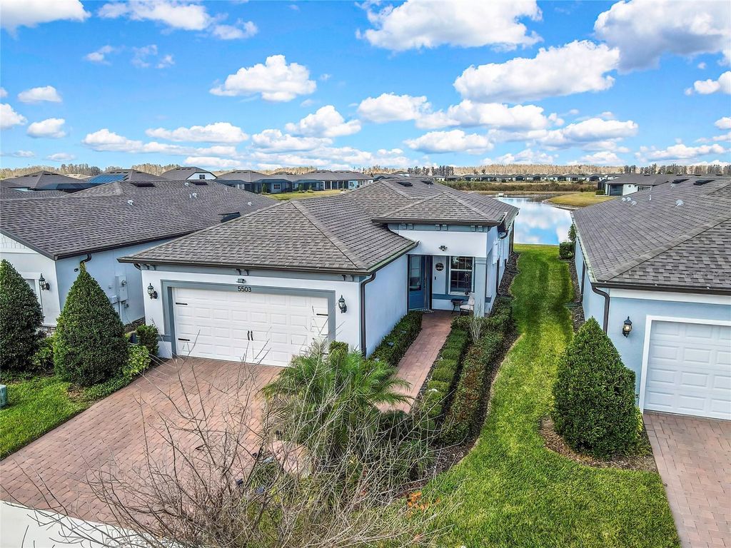 Photo of 5503 Blue Crush Bend, Land O Lakes, FL 34638 (MLS # TB8469130)