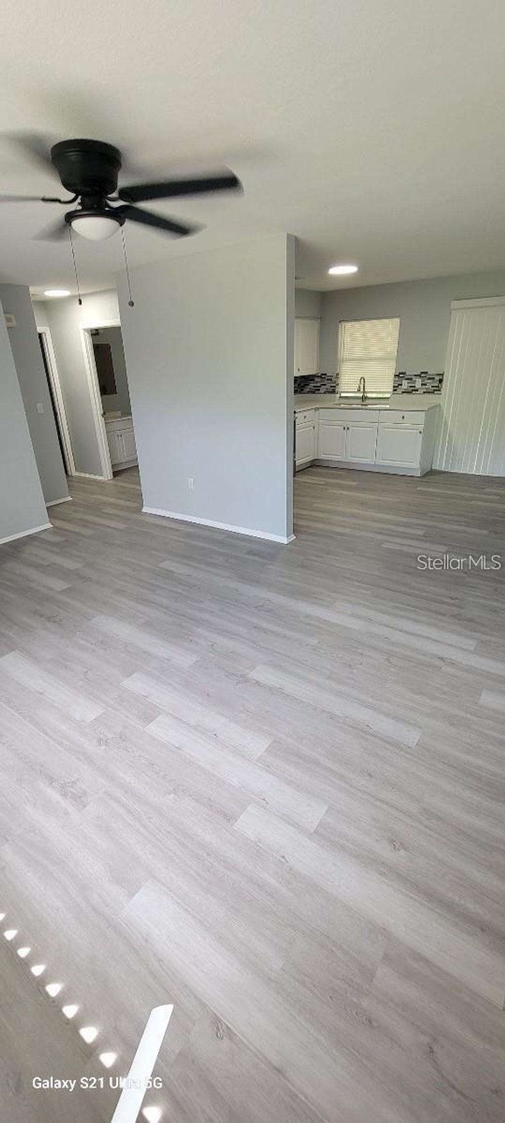 Photo of 2498 Lakeshore Circle, Port Charlotte, FL 33952 (MLS # TB8447479)