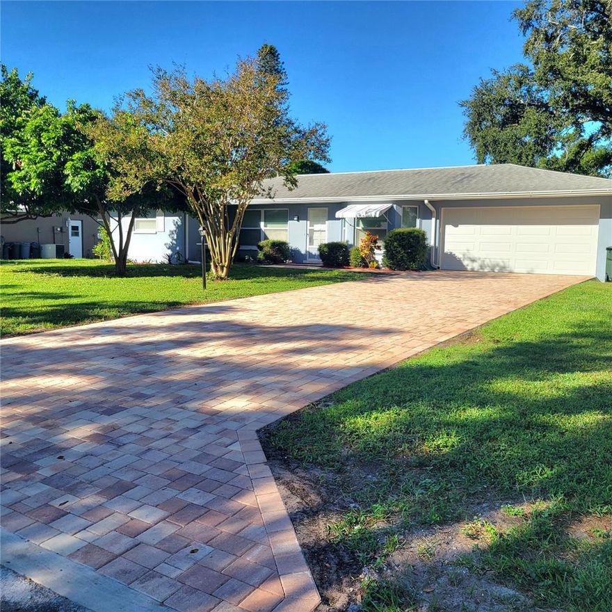 Looking for your dream home close to Gulf beaches, but not worry about the flood hazard and evacuation?  You may want to check out this one only minutes away from Indian Rocks Beach. This renovated single family home features new paver driveway and walkway. It also has zone 5 rated impact double garage door. Entering the living room, the spacious, open layout offers the atmosphere of home sweet home. Freshly painted interiors.  Upgraded kitchen comes with stone countertops, solid wood cabinets and new appliances. Both Breakfast nook and dining room have bay windows. The waterproof vinyl plank flooring goes from room to room. The pocket door in between the living room and bedrooms provides some privacy when you use it. Hallway bathroom comes with dual sinks vanity, and a tub. 2nd bathroom next to the laundry room has a shower stall and pedestal sink. Properly installed GFCI outlets go throughout this property inside & outside. The aluminum storage shed (11 by 9) stands at the corner of the back yard. A few mature fruit trees--- Sugar apples, star fruits and longans add some sweet bonus to your taste. This 0.24 acres lot offers a potential area for you to add a swimming pool. Shingle roof 2013, HAVC system 2022. This property is ready to move in!! Come to see it and hope you love it!!!!