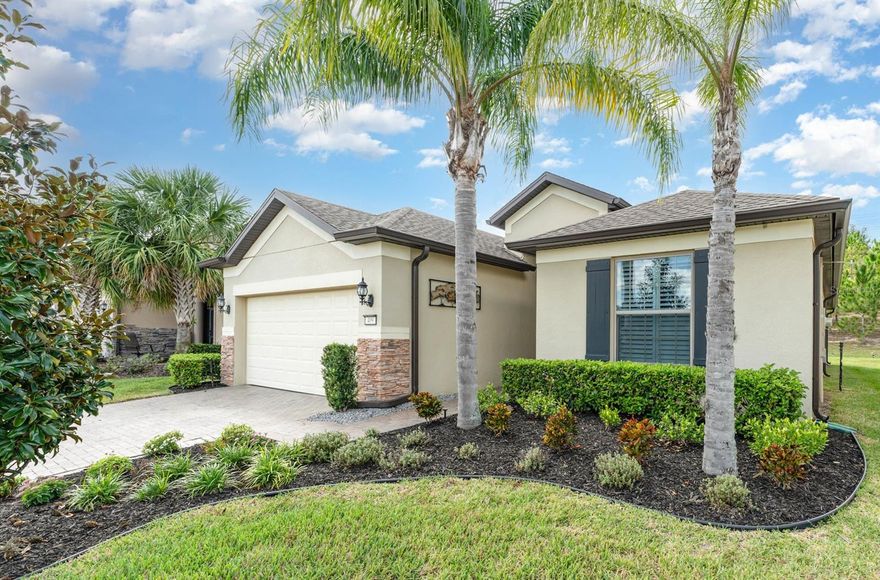 Exceptional Summerwood Model in Del Webb Orlando!
Impeccably maintained and move-in ready, this 3-bedroom plus den, 2-bath home is located on a quiet street with complete privacy at the back, facing a hill with mature pine trees.  Designed with comfort and style in mind, this popular open-concept floor plan offers spacious living areas, elegant finishes, and modern energy efficiency.
The gourmet kitchen features white cabinetry, granite countertops, stainless steel appliances, gas range, pendant and recessed lighting, and an oversized island with bar seating. Adjacent to the kitchen, the formal dining area offers flexibility for entertaining, hobbies, or reading.
Enjoy the inviting atmosphere created by tall ceilings, arched entryways, and abundant natural light. The grand foyer welcomes guests with a custom etched-glass front door. The guest bedroom includes plantation shutters and access to a full bath with granite counters. French doors lead to a spacious den/office, which can serve as an optional third bedroom.
The primary suite is privately situated at the rear of the home, offering peace and privacy with no rear neighbors. The en suite bath features dual vanities, a large tiled walk-in shower, linen closet, and a custom-shelved walk-in closet.
Additional highlights include a spacious laundry room with new washer and dryer, built-in shelving, and plenty of storage, including the spacious extended 2-car garage.
Step outside to enjoy Florida living on the fully covered and screened lanai with multi-slide patio doors, overlooking a beautifully landscaped backyard with rubber mulch, full guttering, and mature palm trees. Curb appeal shines with a paver driveway, concrete curbing, and fresh exterior paint.
Energy-efficient solar panels provide fantastic monthly savings. Low HOA of $277/month includes lawn care and access to world-class amenities—no additional clubhouse fees!
Del Webb Orlando is a premier 55+ gated community offering indoor and outdoor pools, fitness center, tennis, pickleball, bocce, walking trails, clubhouse activities, optional golf, and RV/boat storage. Conveniently located near Disney, shopping, restaurants, medical facilities, and all that Central Florida has to offer.
Experience resort-style living at its best—schedule your showing today!
