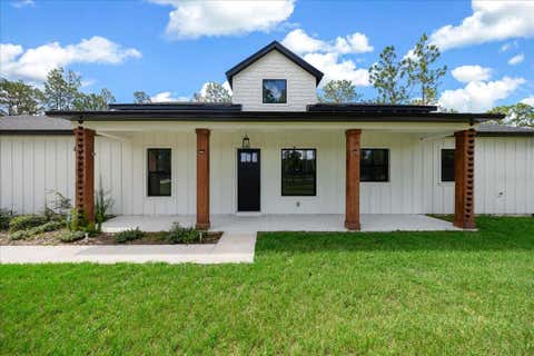 Photo of 12460 SW 48th Lane Road, Ocala, FL 34481 (MLS # OM727228)