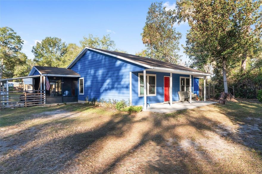 Welcome Home to This Charming 3-Bedroom, 2.5-Bath Home on a Spacious 0.61-Acre Fenced Lot in Archer, FL! Archer is quickly becoming a popular choice for buyers relocating from Newberry and Gainesville, offering a more affordable option while remaining conveniently located. 
This Unique Property features a Welcoming Front Porch perfect for your morning coffee, an Updated Kitchen with stainless steel appliances including a double oven, and a Charming Screened and Extended Lanai. The Third Bedroom offers a Private Entrance and its Own Deck, providing flexibility for guests, extended family, or a home office setup.
Recent Updates include Fresh Exterior Paint, AC (2021), New Windows throughout the home (2020), Water Heater (2018), and a NEW ROOF to be installed prior to closing. The utility room includes washer and dryer hookups and a convenient half bath.
Situated on a Fully Fenced 0.61-Acre lot with a wooden fence, the property also includes an Additional approximately 400 sq ft Detached Structure built in 2024 (not permitted and not included in the total square footage). This structure is currently used as a Studio-Style Guest Space and features a Spacious Covered Porch, Metal Roof, its own AC unit, Kitchenette, and a Full Bathroom. Buyer to verify all uses and permitting. The detached structure also offers Standing-Room Attic Space, providing ample storage. This charming property offers versatility, space, and value in a growing area. The Zoning R2 allows some farm animals such as chickens and pigs offering you a special Mini-Farm Option. Close commute to Newberry (15 min), Gainesville about 20 minutes, and Ocala about 40 minutes. Sold AS IS with the right to inspect. Schedule Your Private Showing Today!