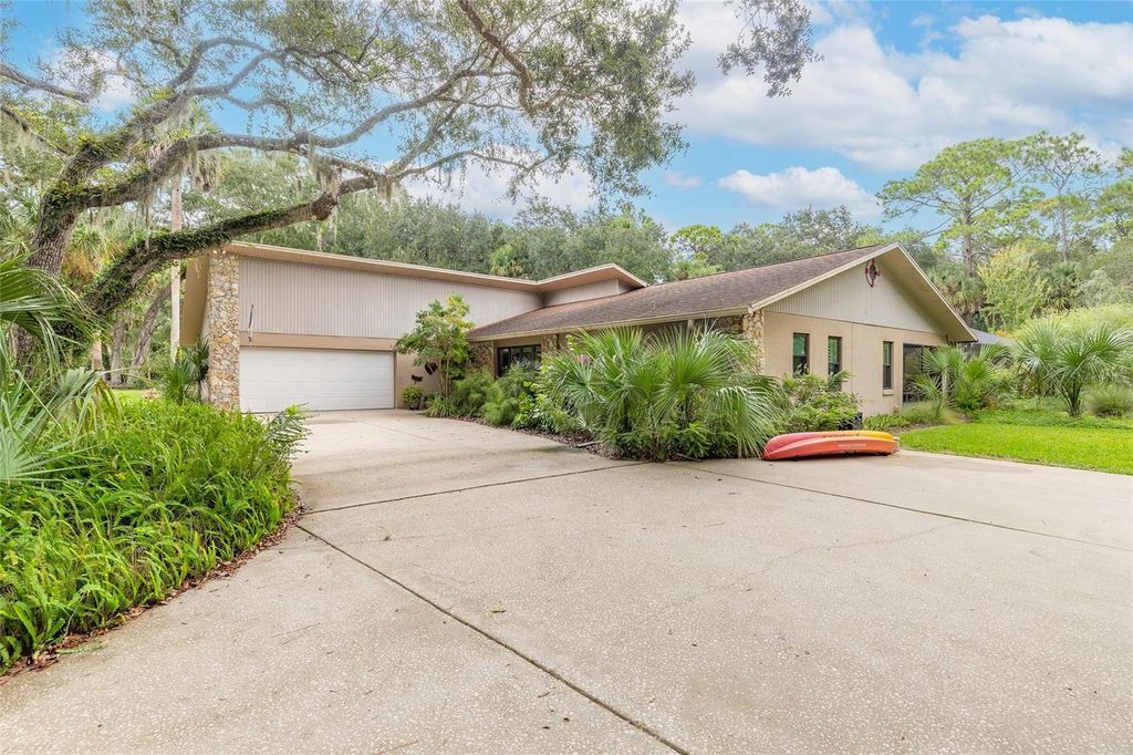 Photo of 59 Village Drive, Ormond Beach, FL 32174 (MLS # NS1086150)
