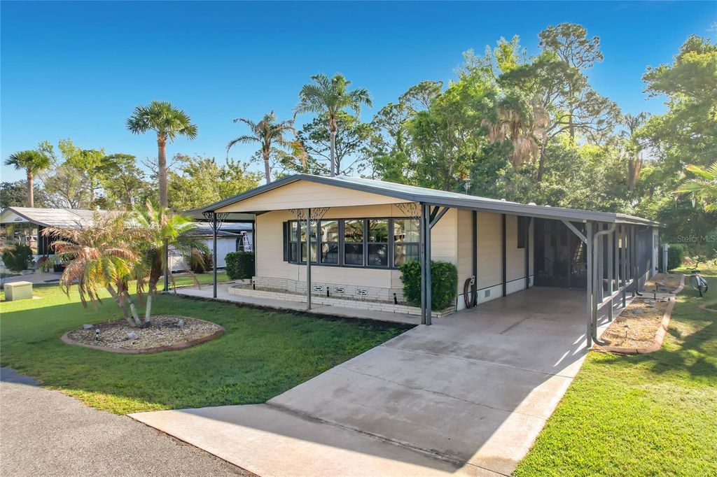 Photo of 6561 Chinaberry Dr NE, Winter Haven, FL 33881 (MLS # L4960831)