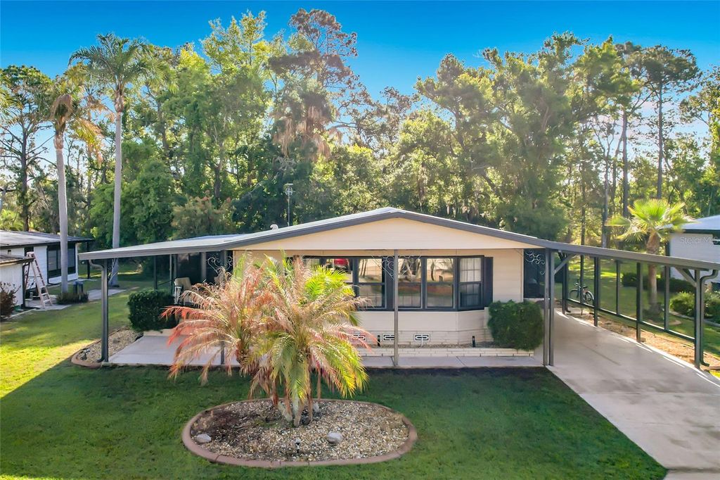 Photo of 6561 Chinaberry Dr NE, Winter Haven, FL 33881 (MLS # L4960831)