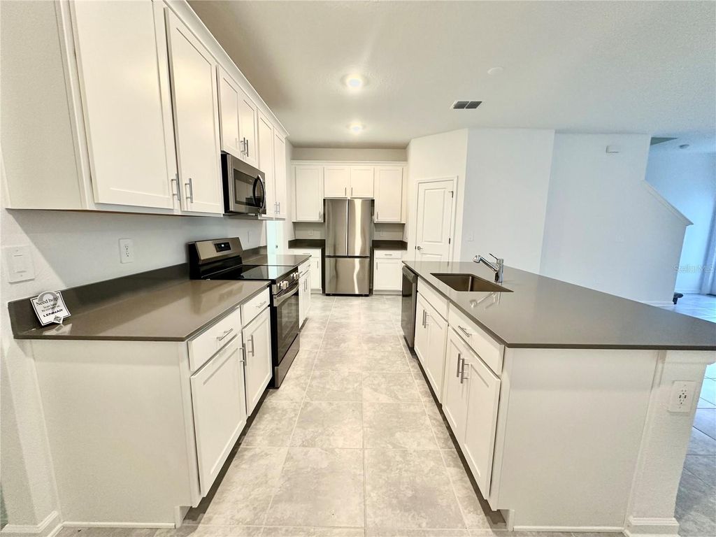 Photo of 6457 Blisfull St, Clermont, FL 34714 (MLS # O6402303)