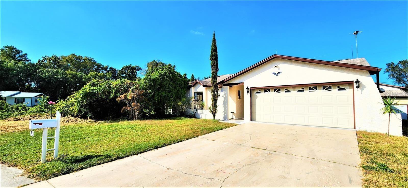 Beautiful 2 bedroom 2 bathroom 2 car garage water view home located in the Magnolia Valley Community of New Port Richey, features tile flooring throughout, corner lot with a beautiful yard are overlooking a pond. Nice and bright open floor plan, a must see !!