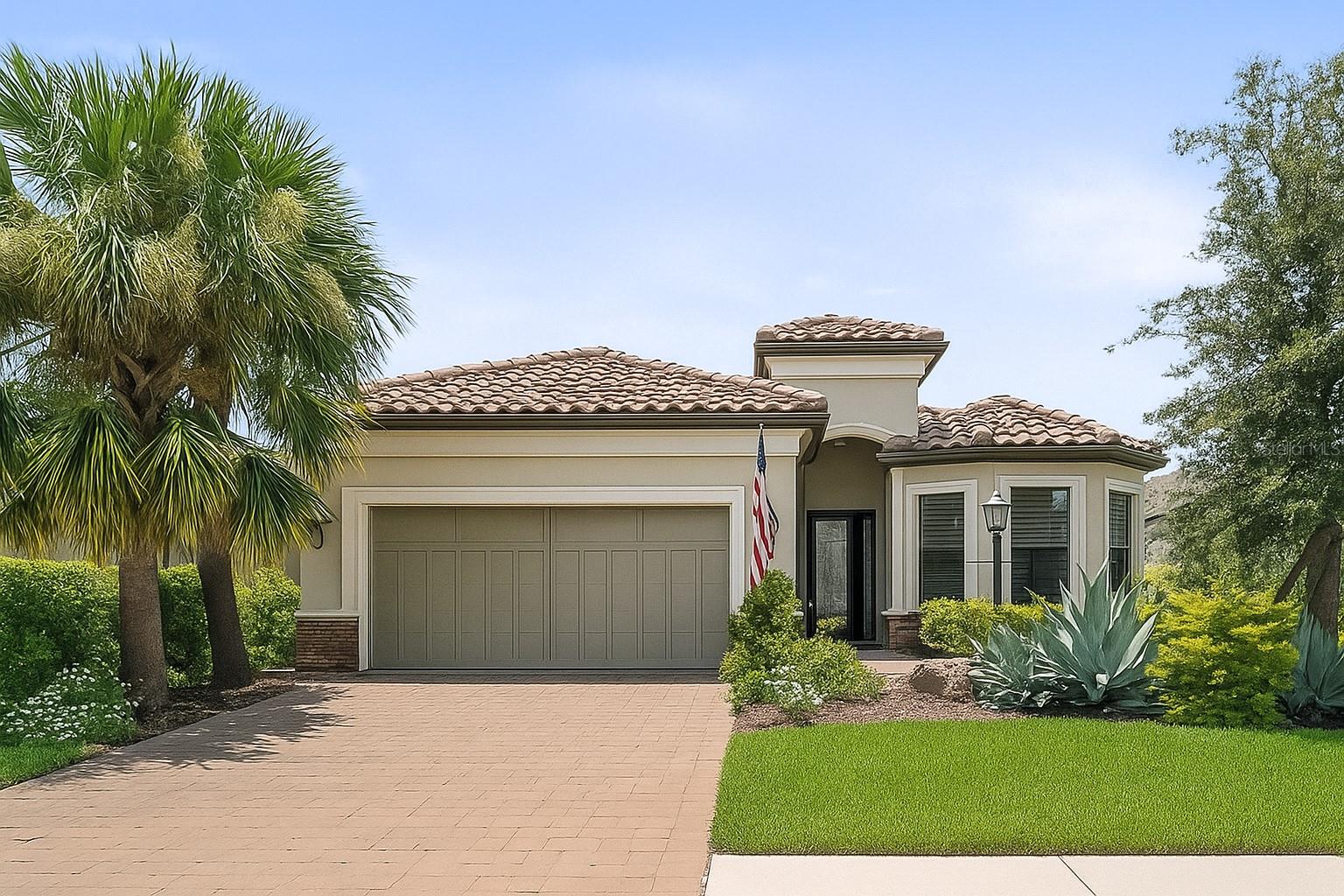 One or more photo(s) has been virtually staged. Welcome to Resort-Style Living at Esplanade on Palmer Ranch, one of Palmer Ranch's rare gated communities offering a true resort lifestyle. This beautifully maintained 3-bedroom, 3-bathroom Lazio model plus den, pool/spa home at just under 2,400 sq.ft. sitting on a private preserve view lot is ideally located just a short distance walk or bike or commute to the amenity center. Interior upgrades include matching tile throughout (no carpet!), kitchen filtration system, soft close cabinets, upgraded landscaping, new lighting throughout, hurricane-resistant front door and more! The chef’s kitchen with its oversized island flows seamlessly into the open living and dining areas—perfect for entertaining. The garage provides storage, while the covered lanai has been enhanced with an outdoor kitchen and complete private outdoor oasis. Esplanade community offers amenities to include on-site Bahama Bar restaurant, Resort-style pool, lap pool & resistance pool, splash park, hot tub & full-service spa, state-of-the-art fitness center with private studio & group classes, 8 pickleball courts, 2 tennis courts, 3 dog parks, private nature trail, endless activities and two direct private accesses to Legacy Trail just minutes away On-site management & proximity to top-rated schools.