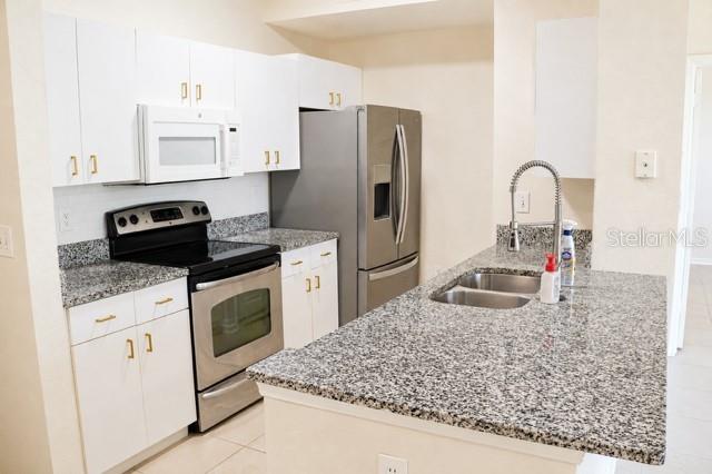 JADE AT TAMPA PALMS A CONDOMIN - Residential