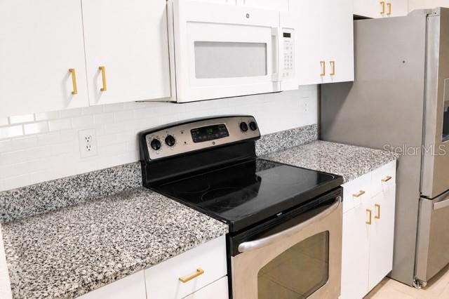 JADE AT TAMPA PALMS A CONDOMIN - Residential