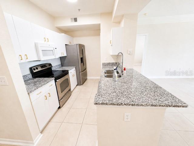 JADE AT TAMPA PALMS A CONDOMIN - Residential