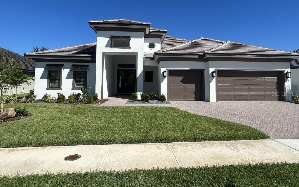 Photo of 180 Juliana Ridge Way, Auburndale, FL 33823 (MLS # TB8431504)