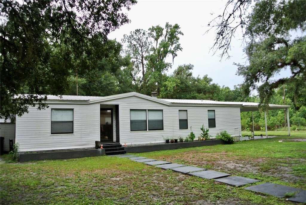 Photo of 38122 Central Avenue, Zephyrhills, FL 33540 (MLS # TB8530256)