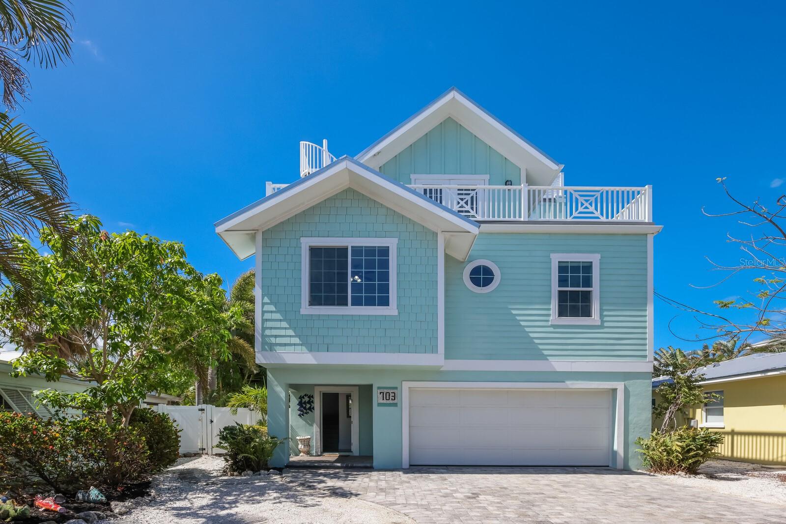 A resort-inspired oasis on Anna Maria’s coveted north end, Welcome to Coconut Breeze! This 4 bedroom 4 bath home embodies the perfect combination of Old Florida Charm and the peace of mind of high-end construction. Located at the “Tip End” of the island, within a short stroll to beach access at Bean Point, Rod n Reel Pier, Pine Aves sidewalk-lined shops, galleries, and eateries. Unpack your suitcase and prepare to sink your toes in the sugary sand beaches and gentle waves. Built-in 2016, with an island state of mind. This home has been prestigiously maintained and encompasses a piece of paradise for all family members. Comfortably sleeping 12 guests, granted by the Bert Harris Award in a rare weekly rental zone, making this home the perfect retreat for family and friends. The main living space allows for hosting with a spacious kitchen that opens to the living room and 10+ accommodating dining room. Throughout the home, there are multiple en-suites and outdoor balcony access providing just the right amount of privacy for guests and extended family. For the anglers, swimmers, and sun lovers in your crew, there are many walkable city access points to the waters of Tampa Bay and the Gulf of Mexico. Enjoy a sunset cocktail with panoramic views of the water oasis and the famous Sunshine Skyway bridge from the Skydeck. This home offers a stress-free lifestyle from the low-maintenance landscaping, metal roof, and lifetime - trex decking wrap-around porches. Some of the many features include a saltwater heated pool, a full summer kitchen, outdoor dining/lounge, and patio entertainment, along with an outdoor shower. Discover the ultimate peace and solitude you've been looking for! Privately fenced yard, 2 car garage with ample storage for all toys and extras! Coconut Breeze is an active vacation rental being offered furnished with a list of personal exclusions provided by the seller. You’ll sure to be impressed by the craftsmanship of construction, luxury finishes, and abundant natural light. Schedule a private showing to make this retreat your own!