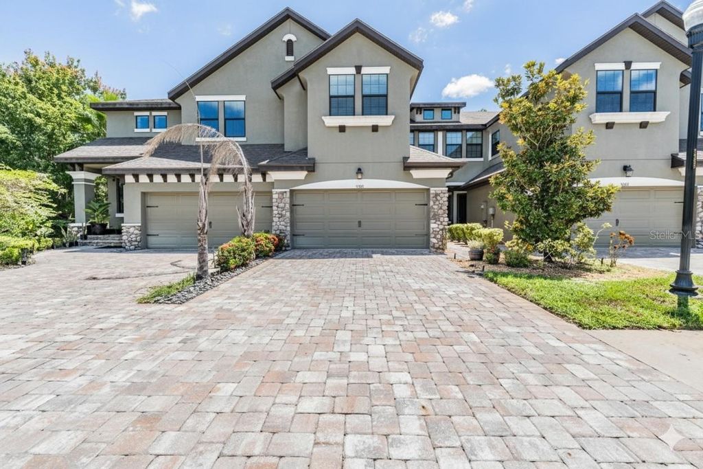 Photo of 5058 Wandering Way, Wesley Chapel, FL 33544 (MLS # TB8420138)
