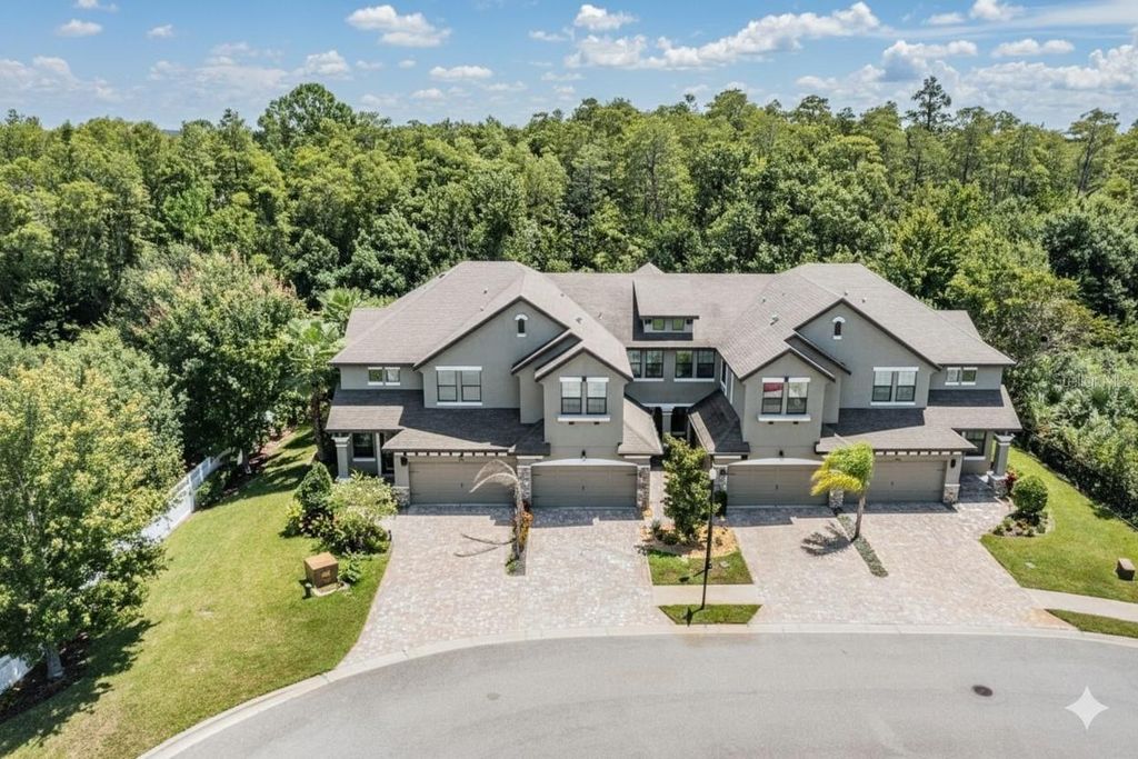 Photo of 5058 Wandering Way, Wesley Chapel, FL 33544 (MLS # TB8420138)
