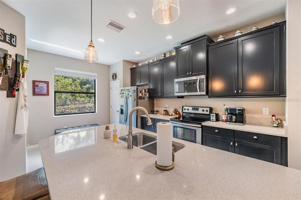 Photo of 5058 Wandering Way, Wesley Chapel, FL 33544 (MLS # TB8420138)