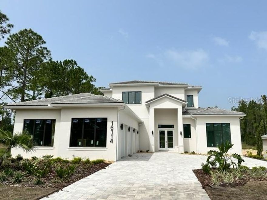 This 4 bed/4.5 BA home is being crafted by Primo Homes on homesite 219 in Bella Collina-Central Florida’s finest private golf community. The home is planned to be the definition of modern elegance and features a host of finishes. The open kitchen is designed beautifully to incorporate a bar countertop, contrasting upper and lower cabinetry and stainless-steel Thermador appliances. The private dining room sits neatly adjacent to the kitchen area overlooking the patio and pool. The Master suite design creates a large private enclave with its high ceilings, a beautiful master bath featuring spacious walk-in shower separate double vanities and separate tub. The oversized walk-through custom closet is beautifully crafted with wood trim. The first floor is completed by a second, ensuite bedroom and additional space that can be used as a bedroom or home office, and laundry. The pool area is designed with entertainment in mind. The screeded lanai is supported by a true summer kitchen complete with grill, and built-in hood featuring a heated pool and spa. The second floor hosts two en-suite bedrooms and large gathering loft with a huge private balcony overlooking the rear of this private homesite. Reserve your appointment today to preview this fine home experience the Club at Bella Collina.