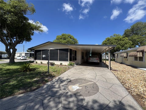 Photo of 6733 Kensington Drive NE, Winter Haven, FL 33881 (MLS # G5113718)