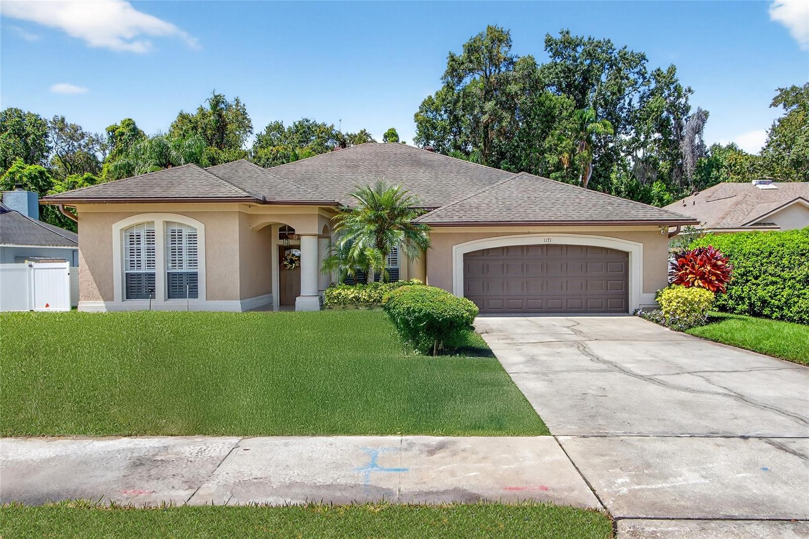 GORGEOUS & LOVINGLY RENOVATED ONE-STORY OVIEDO POOL HOME! This home sits on a 0.26 ACRE CUL-DE-SAC LOT WITH CONSERVATION BEHIND THE HOME. Both sides of the backyard are fenced to create your own private oasis. This 2338 heated square foot and 3286 total square foot home offers 4 bedrooms, 2.5 bathrooms, formal living & dining room, great (family) room, kitchen, breakfast, and a dedicated laundry room plus an over-sized (23’ x 23’) 2 car garage. The back covered porch is 400 square feet large – a great place to relax and unwind and enjoy the peace and privacy of the back conservation – talk about coming home to relax and unwind! This is the home for you! You will love this huge, extended, covered porch, and screened pool (26’ x 16’) area! MANY HOME UPDATES WILL GIVE THE NEW OWNER PEACE OF MIND: *BRAND NEW (9/2025) SEPTIC TANK, DRAINFIELD, AND PUMP *COMPLETE REPIPE (2024) *POOL RESURFACE W/ PEBBLE TEC FINISH & DECORATIVE TILE & NEW COOL DECKING (2023) *NEW SOD IN FRONT YARD & NEW IRRIGATION BOX PLUS PARTIAL REPIPING ON IRRIGATION SYSTEM WHICH COVERS ENTIRE YARD (2025) *NEWER HURRICANE APPROVED GARAGE DOOR *ROOF & REBUILT CHIMINEY + 4 NEW SKYLIGHTS WERE INSTALLED + 4 NEW TURBINE VENTS & NEW COVERED PATIO CEILING (2015) PLUS GUTTERS & DOWNSPOUTS *HVAC (2015) Annually serviced *HOT WATER HEATER 2018 *FRONT DOOR & FRAME RECENTLY REPLACED *COMPLETE RENOVATION OF PRIMARY BATHROOM & THE HALF BATH + PARTIAL REMODEL OF 2ND BATHROOM * LUXERY LAMINATE FLOORING THROUGHOUT MOST OF THE HOME *COMPLETE KITCHEN REMODEL, SOLID WOOD MAPLE CABINETS, WITH UNDER CABINET LIGHTING, WITH PULL OUTS, DRAWERS, WASTE PULLOUT & CABINET DEPTH REFRIGERATOR, GRANITE COUNTERS, & STAINLESS STEEL APPLIANCES. *INTERIOR PAINT & WHITE WASHED FIREPLACE (2023) *5 1/3 BASEBOARDS & CUSTOM LIGHTING *PLANTATION SHUUTERS THROUGHOUT INTERIOR. 1171 New Castle Court is a very clean home AND MOVE-IN READY HOME. Mac Kinley’s Mill is a quiet Oviedo community with about 100 homes; there is a park-playground and there are pickleball/tennis courts and only $600.00 a year HOA dues. Mac Kinley’s Mill does not bear “cut-through” traffic onto N Central Avenue/434. Ready to move into homes like this rarely come up for sale. Act today to see this fantastic, well priced home that is now available for sale! As-Is.