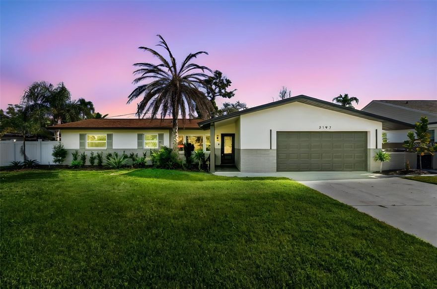 Located in the heart of Snell Isle just moments from the Vinoy Golf Club, this beautifully redesigned 3-bedroom, 3-bath pool home delivers a rare blend of modern design, quality upgrades, and effortless everyday living. With nearly 1,900 square feet of refined interior space, every detail has been thoughtfully curated to create a clean, elevated feel from the moment you step inside. The home showcases polished concrete flooring, contemporary architectural accents, and a striking architectural ceiling feature anchors the main living space complete with a backlit inset and integrated LED perimeter. At the center of the home is a stunning kitchen designed to impress, featuring quartz countertops, modern cabinetry, and custom touches that make it equally suited for entertaining or quiet nights in. The primary suite offers a true retreat, complete with a spacious walk-in closet and a fully renovated ensuite bath with modern finishes and a spa-like feel. A separate bonus den/office adds flexibility for work-from-home living, a lounge space, or additional guest accommodations. Step outside to your own private pool oasis, surrounded by generous deck space, perfect for hosting, relaxing, and enjoying the Florida lifestyle year-round. Additional highlights include a two-car garage, updated plumbing, and major system improvements including a newer HVAC (2023), water heater, and new electrical updates (2025), providing both style and peace of mind. Set on a quiet street in one of St. Petersburg’s most desirable neighborhoods, you’re just minutes from downtown, waterfront parks, museums, restaurants, and premier shopping. A truly turnkey opportunity in a location that continues to stand out year after year. Make your appointment today!