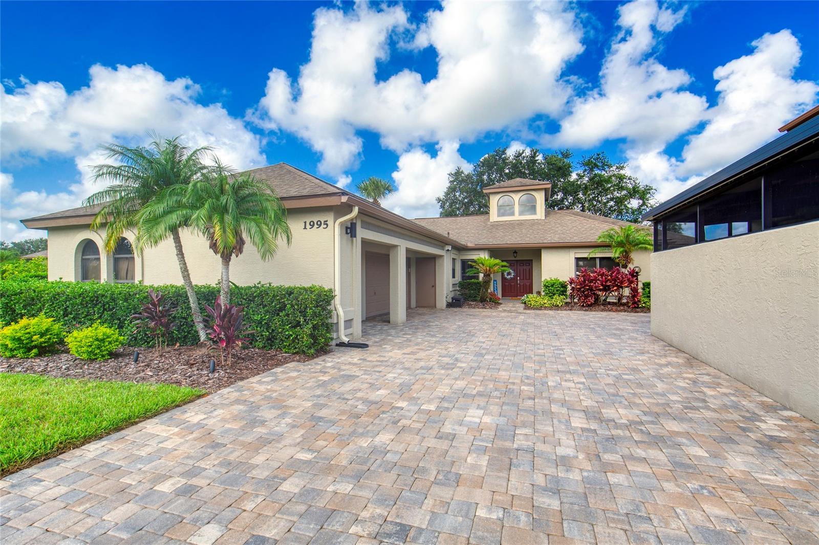 Welcome to your dream home in the prestigious, guard-gated Spruce Creek Fly-In — one of the most unique residential airpark communities in the country. This 3-bed, 2-bath, 3-car garage pool home blends elegance and comfort. Inside, enjoy a bright open-concept layout with tile flooring throughout and abundant natural light. The spacious kitchen features granite countertops, stainless steel appliances, and ample cabinetry — perfect for daily living or entertaining. The primary suite is a peaceful retreat with his-and-hers vanities, a garden tub, walk-in shower, and generous closet space. Two additional bedrooms offer flexibility for guests, family, or office use. Step outside to your private, renovated heated saltwater pool and spa with new pavers, screening, and covered lanai. All this is located in Spruce Creek Fly-In, a 24/7 guard-gated community (separate membership fees apply) with a private airport runway, golf course, tennis, pickleball, parks, trails, and clubhouse amenities.
Square footage received from tax rolls. All information intended to be accurate but cannot be guaranteed.