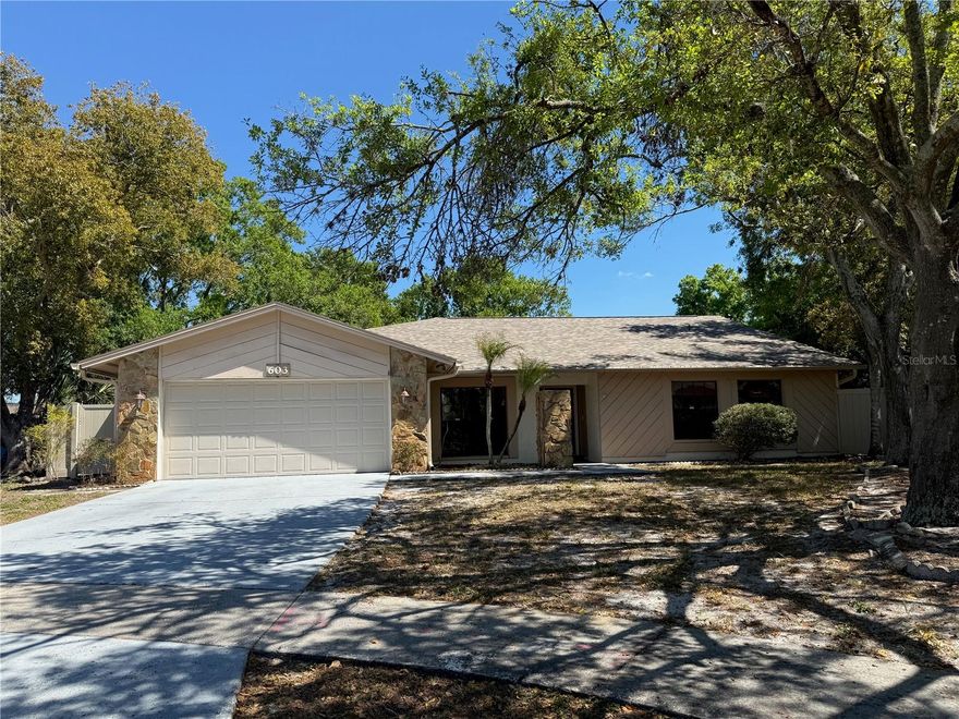 Welcome to this lovely home located in Bloomingdale West neighborhood and enjoy living in this cul-de-sac location.  Local shopping and numerous restaurants just minutes drive away.  Bloomingdale golf course just 1.4 miles away.  Home was remodeled in 2010 adding Bedroom 5 (or can be a Bonus/Game Room), roof replaced 2024, Generac generator 22KW LP Gas added 2019, and garage door replaced 2014.  The front entry of home includes large 6x5 foyer with front door glass insert and side light window.  Formal living room 14x12 includes built-in cabinet and ceiling fan.  Formal dining room 13x11 with recessed lighting.  Updated Kitchen 14x10 features wood cabinets, granite countertop, smooth top range, side-by-side refrigerator, lazy Susans in corner cabinets, large pantry cabinet, ceiling fan, tray ceiling, recessed lighting.  Eat-in Kitchen 10x9 featuring tray ceiling.  Primary Bedroom 16x12 with vaulted ceiling, ceiling fan, walk-in closet 6x5 with built-in organized shelving.  Primary Bathroom has separate sinks, large vanity counter space, ceiling fan, linen closet, water closet with walk-in shower & built-in shower seat & glass block window, and tile flooring.  Family Room 14x12 with vaulted ceiling, fireplace, skylight, ceiling fan, built-in shelving, and french doors with built-in blinds.  The very large 5th Bedroom (or Bonus/Game Room) 20x14 features 2 separate closets, built-in drawers/cabinet, and ceiling fan.  Bedroom 2 is 13x12, ceiling fan, walk-in closet 6x6 with pocket door and attic access.  Bedroom 3 is 11x10 with ceiling fan.  Bedroom 4 is 11x10 with mirrored closet doors and built-in organized shelving.  Bathroom 2 features tile flooring, raised comfort counter-height vanity, linen closet, walk-in glass door shower with built-in shower seat.  Hallway has a large walk-in closet 9x7. Half Bathroom features wood cabinet.  Large Inside Utility room 10x6 features built-in laundry sink, built-in cabinets, and closet with built-in organized shelving.  The home also includes tall 5-inch baseboards and 2 panel interior doors throughout.  All windows feature wind-resistant tinting.  Oversized 2 car garage has numerous built-in cabinets, refrigerator, garage pedestrian door, garage door opener, and ceiling fan.  Large enclosed backyard with outdoor shed 12x10, 2 separate air conditioning units, Generac generator for automatic backup power during power outages, and leafless gutters covered with metal shield.  Seller is offering an allowance at closing towards new interior paint and new carpet.