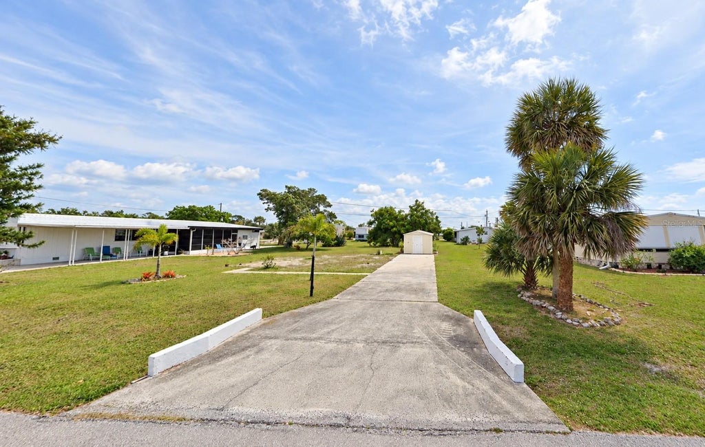 Photo of 1253 Ibis Drive, Englewood, FL 34224 (MLS # C7532573)